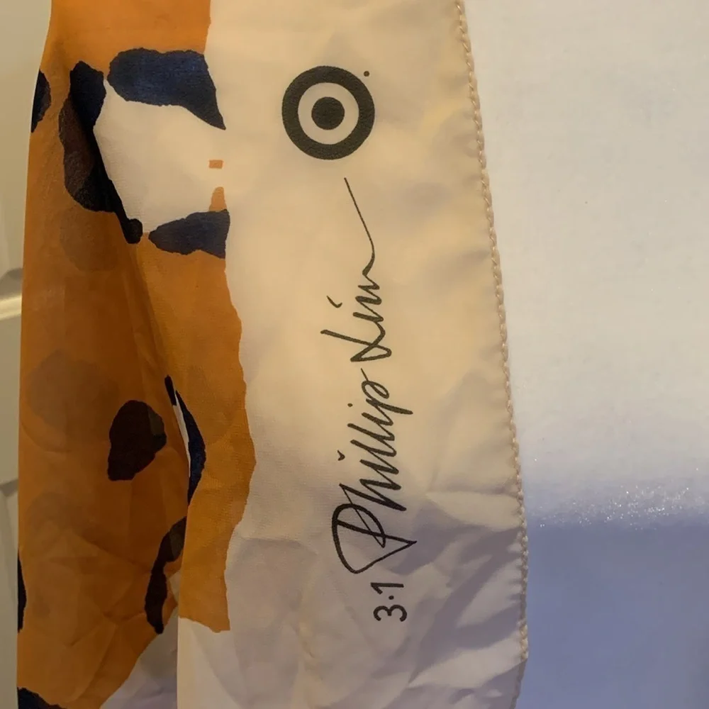3.1 Phillip Lim Womens Silk multi use scarf. Kind of a burnt orange animal print